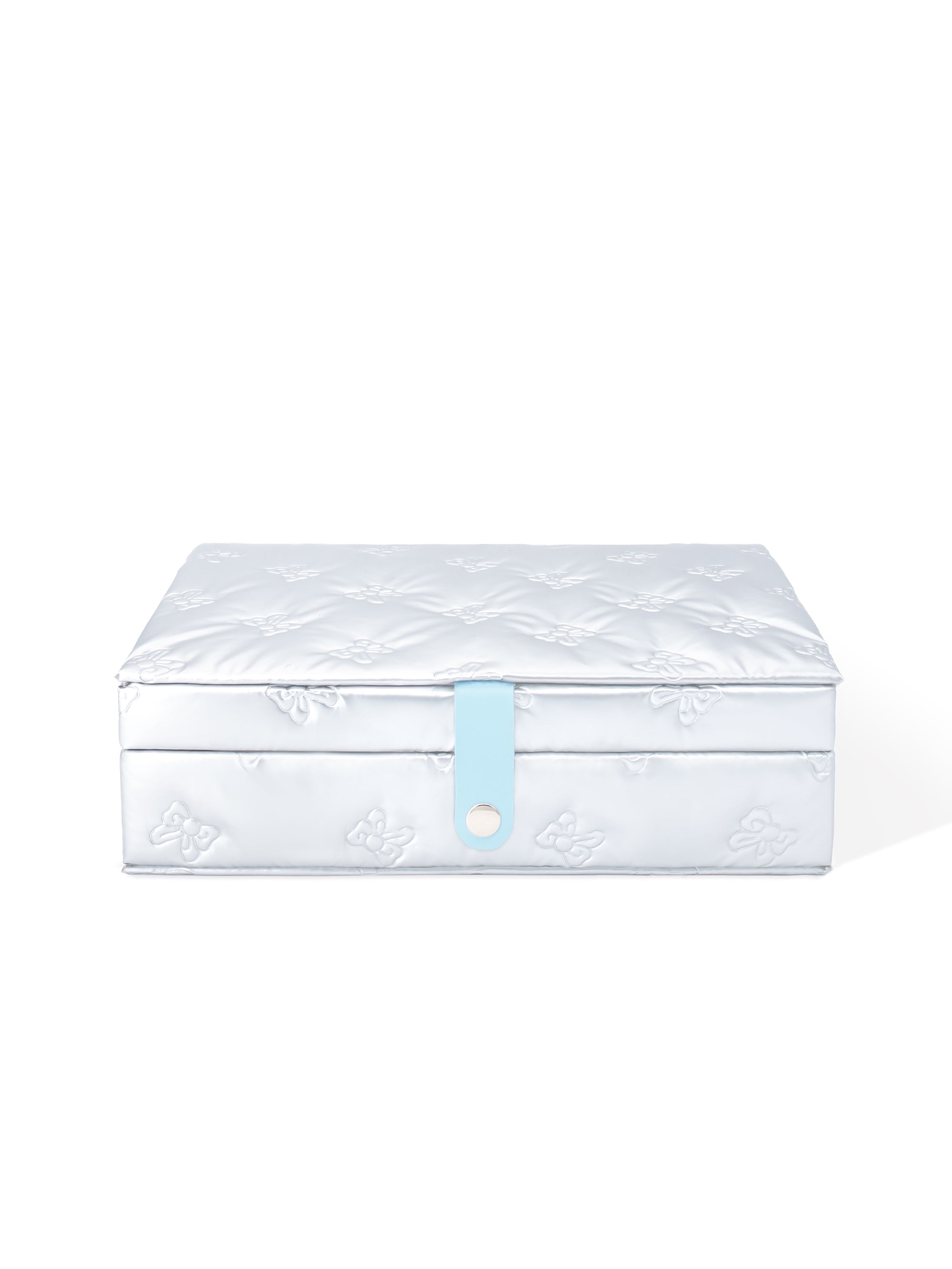 Pufflet Jewelry Box in silver with puffy texture and bow design 