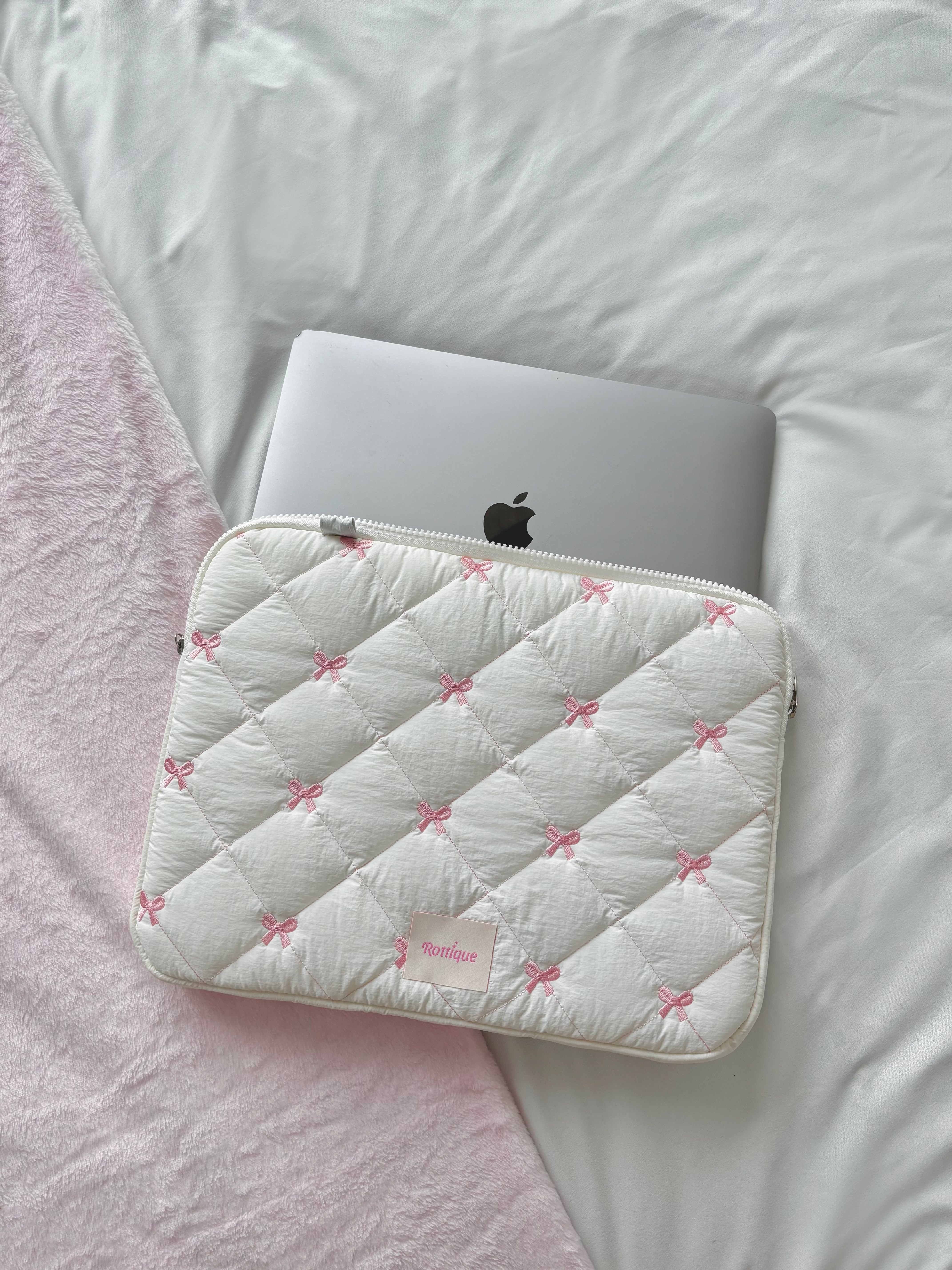 Pufflet Bow Laptop Sleeve with quilted bow knot and puffy texture, girly aesthetic,  detachable strap